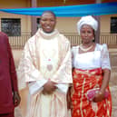Fr Cajetan with his parents at his ordination.