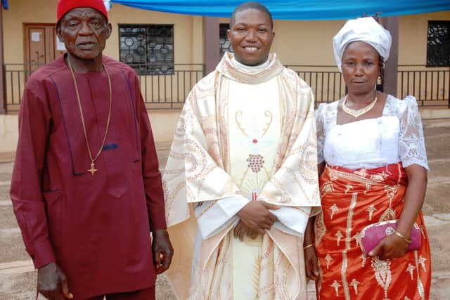 Fr Cajetan with his parents at his ordination.