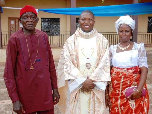 Fr Cajetan with his parents at his ordination.