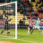 Danny Lafferty puts Derry City ahead with an early header in the club's 2-1 defeat to Shamrock Rovers in Tallaght last October.