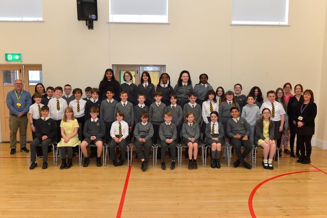 Model Primary School P7 pupils with staff members, from left, Ms Milligan, Mr Bradley, Mrs A. Coyle, Miss Tomlinson and Mrs Carlin. DER22019GS - 022