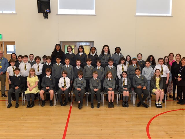Model Primary School P7 pupils with staff members, from left, Ms Milligan, Mr Bradley, Mrs A. Coyle, Miss Tomlinson and Mrs Carlin. DER22019GS - 022