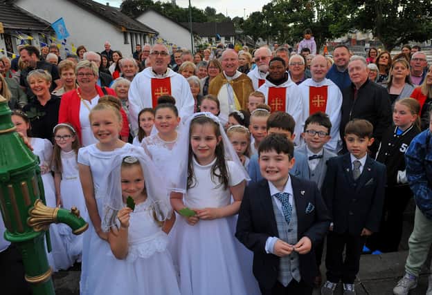 Parishioners pictured with The Most Reverend Dr Donal McKeown, Bishop of Derry, and clergy during the traditional Saint Colmcille Feast Day Blessing at St Columba’s Well in the Bogside, on Thursday evening last. Photograph: George Sweeney. DER2224GS – 036