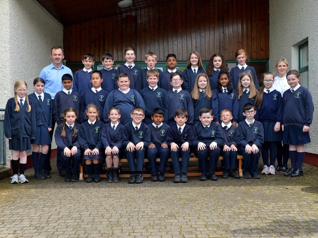 Good Shepherd Primary School P7 class with teacher Mr Herron and principal Mrs McCafferty. DER22019GS - 032