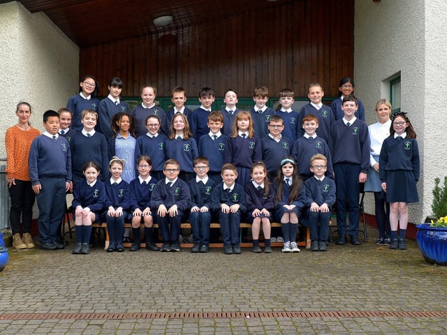 Good Shepherd Primary School P7 class with teacher Mrs Forbes and principal Mrs McCafferty. DER22019GS - 033