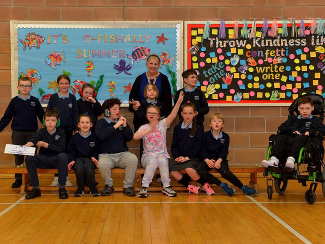 P7 leavers at Ardnashee School pictured with Mrs McCole. DER2220GS – 006