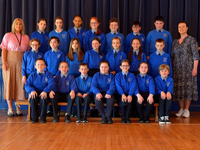 Miss O’Brien, on the right, teaching assistant and Ms Higgins, teacher, with Nazareth House Primary School’s P7 class. DER2220GS – 031