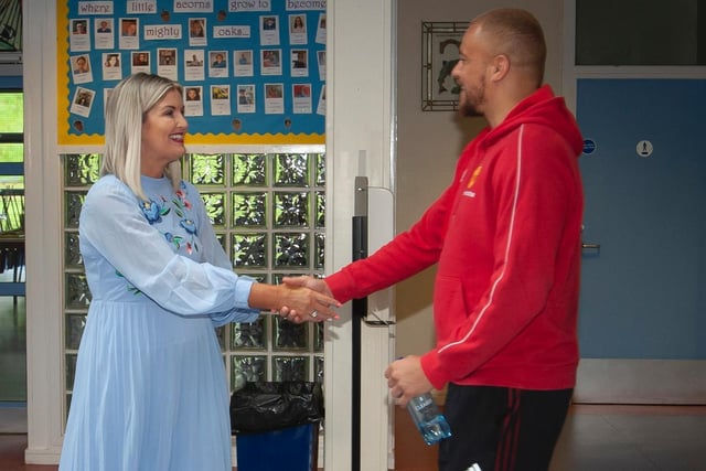 Former Manchester United star Wes Brown is welcomed to Oakgrove Integrated College by Katrina Crilly, Principal, on Friday morning. Picture by Jim McCafferty Photography