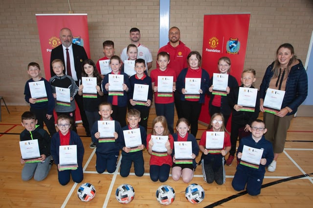 St. Oliver Plunkett Primary School pupils pictured after receiving their certificates on Friday morning. Picture by Jim McCafferty Photography