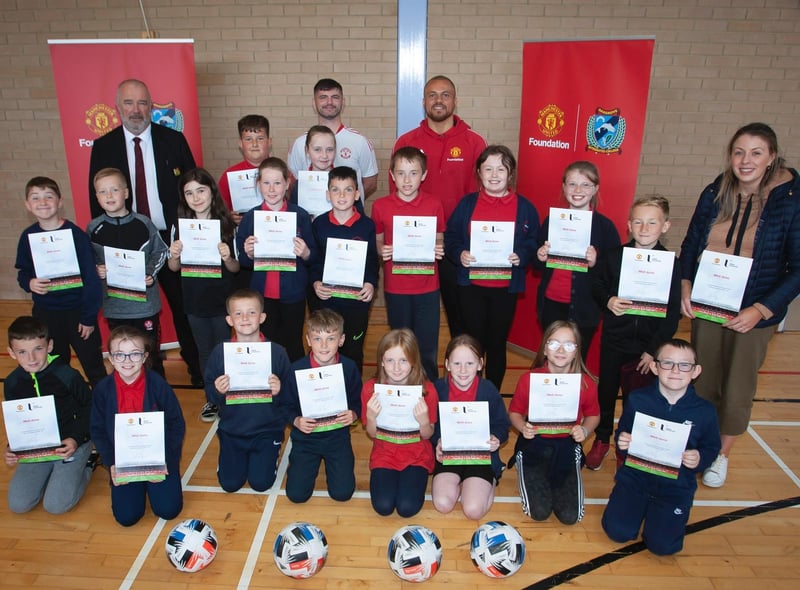 St. Oliver Plunkett Primary School pupils pictured after receiving their certificates on Friday morning. Picture by Jim McCafferty Photography