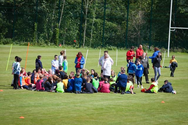 Schoolchildren from Drumahoe, Oakgrove, St. Oliver Plunkett and Ebrington Primary Schools taking part in Friday's event at Oakgrove Integrated College. Picture by Jim McCafferty Photography