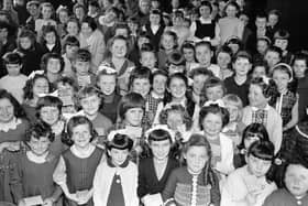 1965... Some of the over 100 entrants in the girls’ solo competition (8-10) gather in the Guildhall Minor Hall.