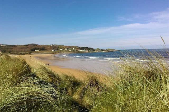 Culdaff Beach in North Inishowen. A beautiful sandy beach with a playground and picnic benches, perfect  for sandy crisp sandwiches after a dip.