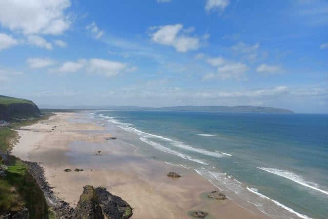 Downhill Strand leading to Benone Beach with Inishowen in the distance. Get the train to Castlerock and walk down to the beach to make a day of it.