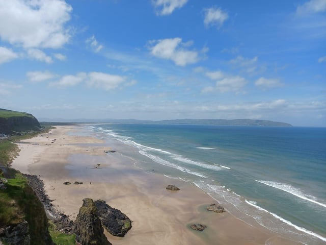Downhill Strand leading to Benone Beach with Inishowen in the distance. Get the train to Castlerock and walk down to the beach to make a day of it.