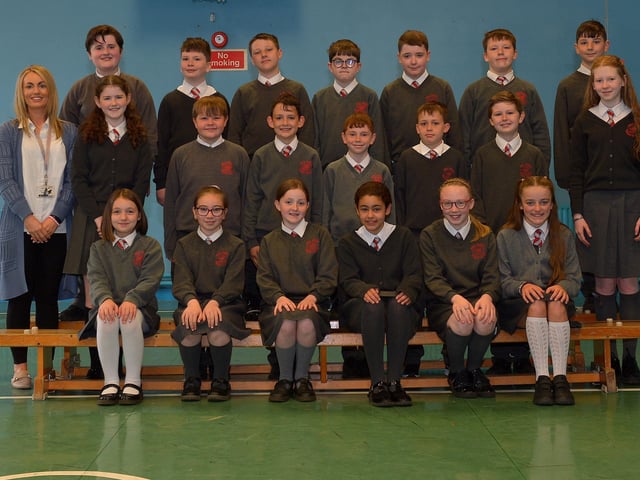 Mrs K. Doherty with her P7 class at Holy Family Primary School. DER2222GS – 037