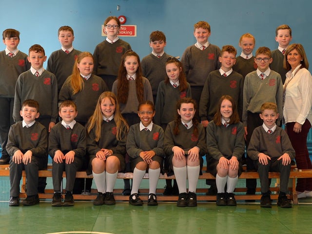 Mrs A. Higgins with her P7 class at Holy Family Primary School. DER2222GS – 035