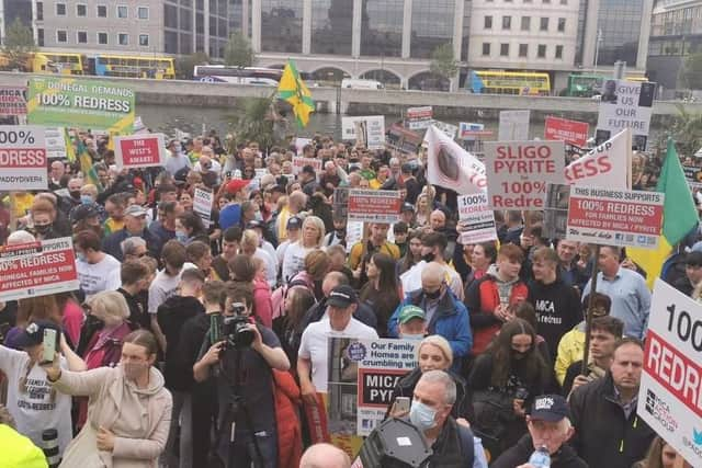 Homeowners at a demonstration calling for redress.