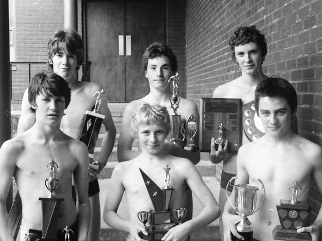 Individual champion winners at a St. Columb’s College swimming gala. Front, from left, Intermediate Section winners, Colin Gavigan, breaststroke, Brian Kelly, backstroke, and Mark Quigley, butterfly, individual medley and front crawl. Back, from left, Senior Section winners, Eamonn Gormley, backstroke and butterfly, John Friel, breaststroke and Kevin Gormley, freestyle and individual medley.