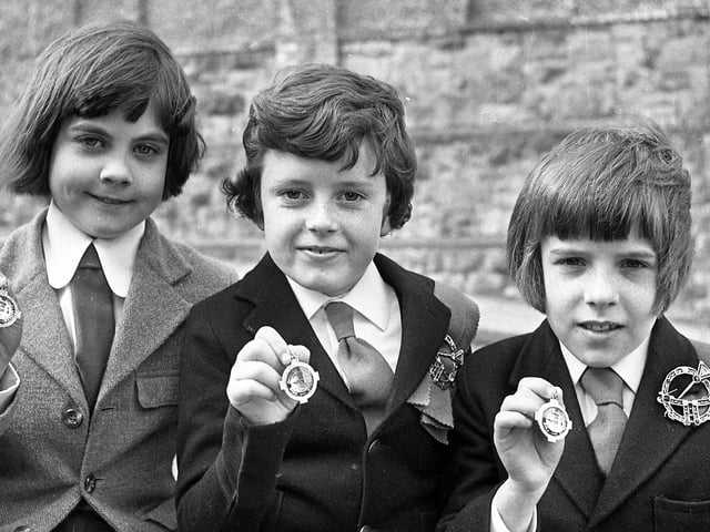1975... Prizewinners in the boys' (8-10 years) double jig. On right is the winner, Colm Colhoun (McLaughlin School); in centre, Ciaran McGuigan (Kerrigan School, Omagh, who was second; and, on left, Liam Averill (McGuigan School, Maghera), who was third.