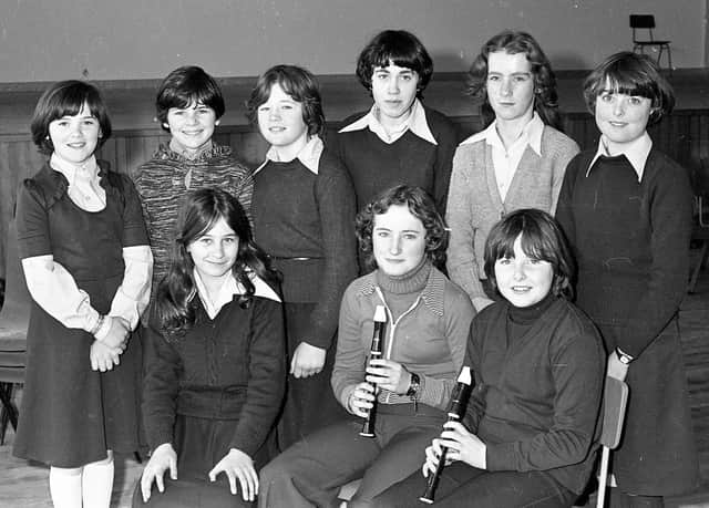 1978... Successful feis pupils in Irish vocals and descant recorder from Carnhill Secondary School. Front, from left: Donna Browne, Gina McChrystal and Siobhan McDermott. Back: Brenda Crossan, Elaine Nixon, Kathy Wade, Louise Doherty, Donna Ward and Lorraine McGeady