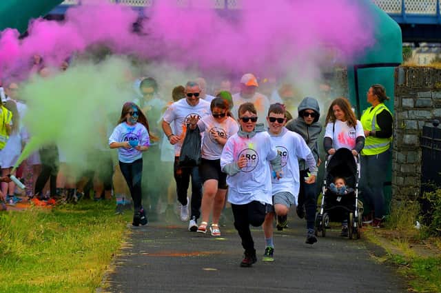 The ARC Fitness Father’s Day 2K Colour Dash gets underway on Sunday afternoon last at Destined, Foyle Road. Photograph: George Sweeney.  DER2226GS – 007