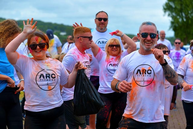 Participants take part in a warm-up before the ARC Fitness Father’s Day Colour Dash held on Sunday afternoon last at Destined, Foyle Road. Photograph: George Sweeney.  DER2226GS – 004