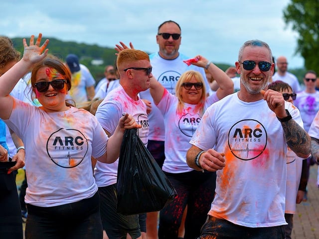 Participants take part in a warm-up before the ARC Fitness Father’s Day Colour Dash held on Sunday afternoon last at Destined, Foyle Road. Photograph: George Sweeney. DER2226GS – 004