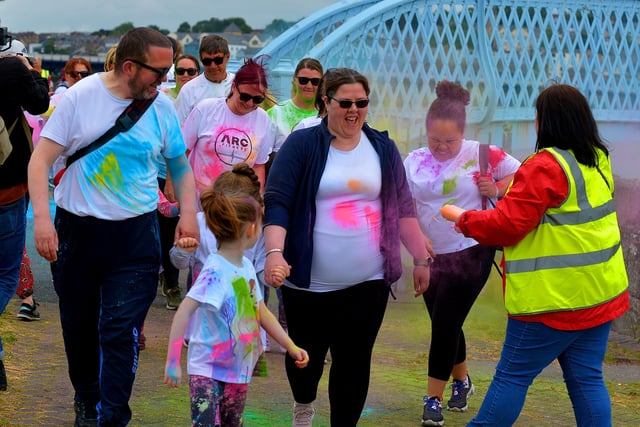 Enjoying the fun at the ARC Fitness Father’s Day 2K Colour Dash on Sunday afternoon last at Destined, Foyle Road. Photograph: George Sweeney.  DER2226GS – 011