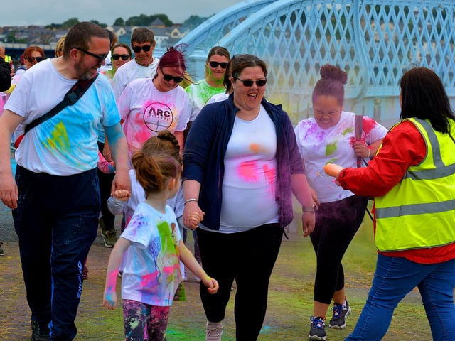Enjoying the fun at the ARC Fitness Father’s Day 2K Colour Dash on Sunday afternoon last at Destined, Foyle Road. Photograph: George Sweeney. DER2226GS – 011