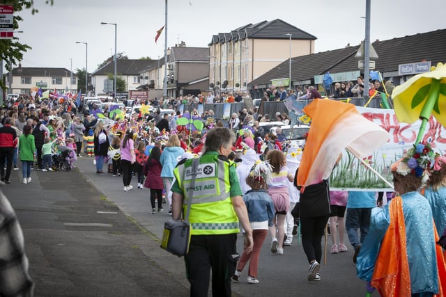 The parade makes its way across Central Drive on Friday evening.