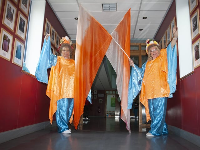 Adorning the corridors of St. Josephâ€TMs Boys School in colour on Friday evening are these two lovely ladies.
