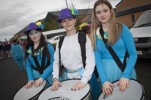 Three young students from St. Ceciliaâ€TMs College adding festive cheer to the Creggan event on Friday evening.