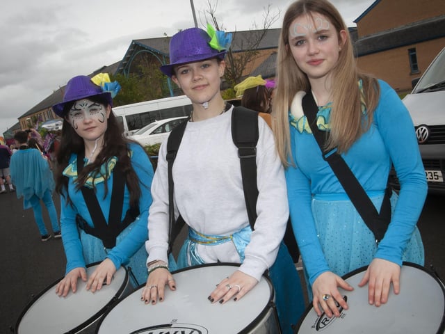 Three young students from St. Ceciliaâ€TMs College adding festive cheer to the Creggan event on Friday evening.