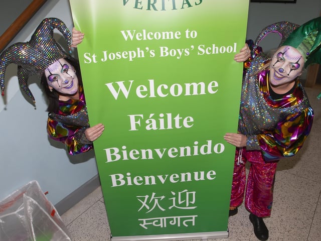Court Jesters Kellie McBrearty and Danielle Devine, Creggan Neighbourhood Partnership hiding behind this pull-up on Friday.