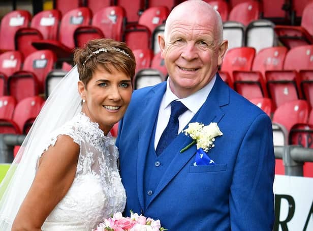 Derry City supporters Carmel and James Devenney pictured on their wedding day at the Ryan McBride Brandywell Stadium, on Saturday. Picture by Kevin Morrison/Event Images & Video