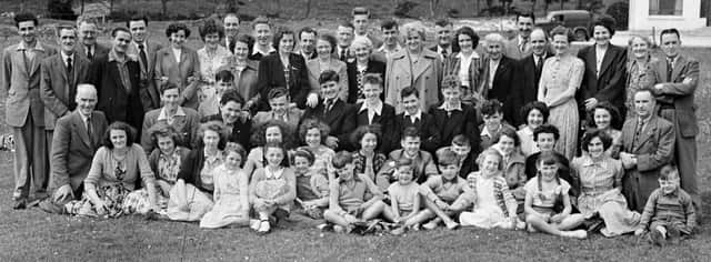 Charlie McDermott, tenth from left, back row, with former colleagues  at the  Derry Journal summer outing for staff, relatives and friends to Bundoran. Included are Charlie Haslett, Bobby Toland, Mary McCarroll Snr., Suzie McCarroll, Charlie McBride, William O'Connell, Tony McLaughlin, Liam McCandless, Jimmy Conway, Willie Carson, Frank McCarroll Jnr., Jimmy McCarroll, Mary McCarroll and Suzanne McCarroll.