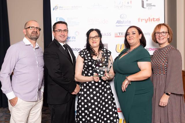 Jenni Doherty, Little Acorns Bookstore, winner of the Overall Business of the Year award at the North West Business Awards, pictured with her family and friends, Andrew, Ronan, Leona and Grainne.