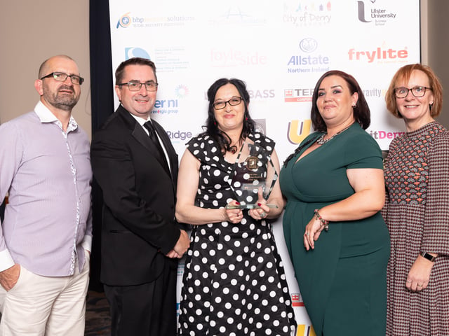 Jenni Doherty, Little Acorns Bookstore, winner of the Overall Business of the Year award at the North West Business Awards, pictured with her family and friends, Andrew, Ronan, Leona and Grainne.
