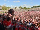 Derry captain Christopher McKaigue lifts the trophy after his side's victory in the Ulster GAA Football Senior Championship Final between Derry and Donegal at St Tiernach's Park in Clones, Monaghan, which booked a place in the All-Ireland Senior Football Quarter-Finals.