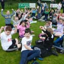 This class taking a well-earned break for lunch during Thursday's Steelstown PS Sports Day. Picture by Jim McCafferty Photography