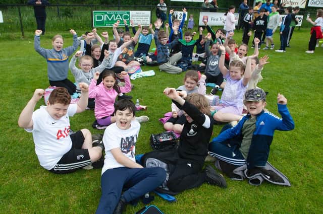 This class taking a well-earned break for lunch during Thursday's Steelstown PS Sports Day. Picture by Jim McCafferty Photography