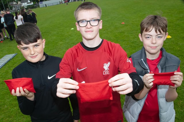 Tossing The Beanbag boys winner Bradan Nicell (centre), with Aidan Doherty (left) 2nd and Aaron McCurry (right) 3rd at the Steelstown PS Sports Day on Thursday. Picture by Jim McCafferty Photography