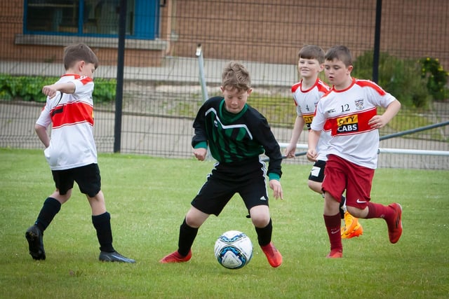 Action from one of the early games involving St. Eugene's PS and Greenhaw PS on Tuesday.