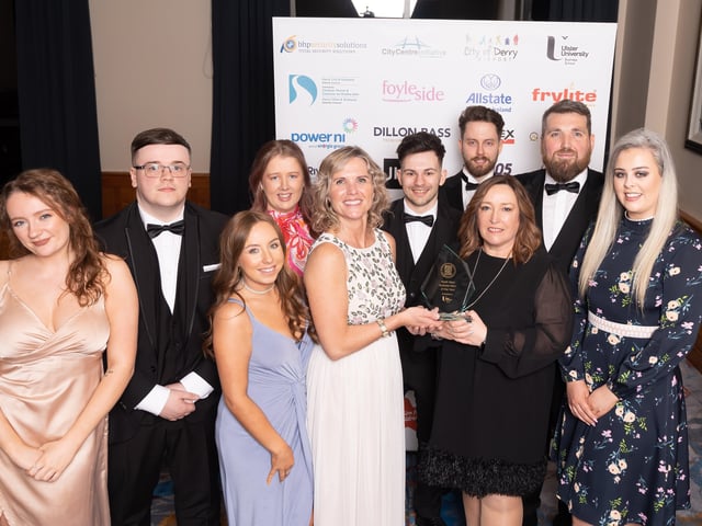 Accepting the NW Business Hero of the Year award on behalf of the winner, John Harkin of Alchemy is Shannon Dolan, Mark O’Doherty, Emma Whoriskey, Brianna Lee, Shirley Barrett, University of Ulster Business School, Szymon Zembala, Justin Martin, Ann O’Neill, Declan Meenan, Gabrielle Skelton, pictured with the award sponsor Shirley Barrett of University of Ulster Business School.