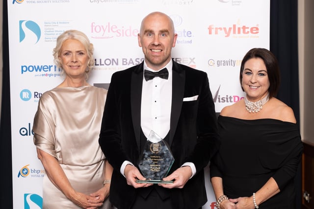 Brian ONeill, Enterprise NW, winners of the Contribution to the NW Economy and Brenda Morgan, award sponsor at City of Derry Airport.