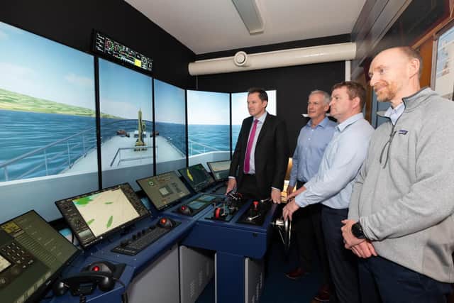 Minister for Agriculture, Food and the Marine, Charlie McConalogue T.D.
visited BIMâ€TMs National Fisheries College in Greencastle today, to officially launch new high tech simulator suites that will enable skipper students to pilot and berth a vessel and navigate it through adverse weather conditions.  Pictured with Garvan Meehan, Principal and Senior Natuical Instructors, John Kelly and John O'Mahony.  Photo Clive Wasson