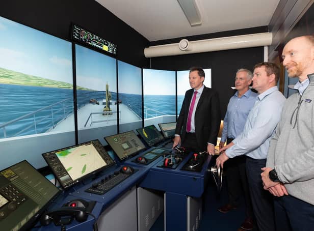 Minister for Agriculture, Food and the Marine, Charlie McConalogue T.D.visited BIMâ€TMs National Fisheries College in Greencastle today, to officially launch new high tech simulator suites that will enable skipper students to pilot and berth a vessel and navigate it through adverse weather conditions.  Pictured with Garvan Meehan, Principal and Senior Natuical Instructors, John Kelly and John O'Mahony.  Photo Clive Wasson