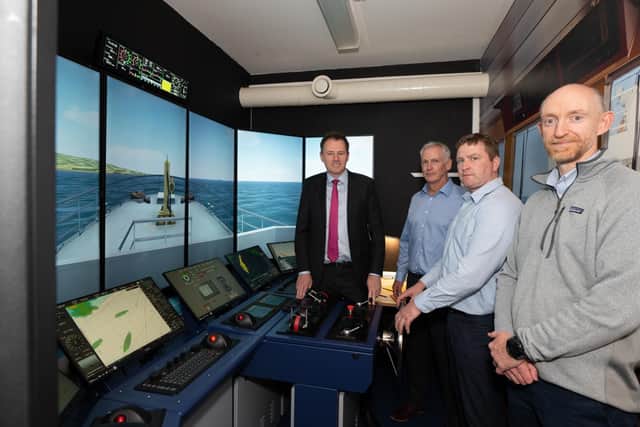 Minister for Agriculture, Food and the Marine, Charlie McConalogue T.D.
visited BIMâ€TMs National Fisheries College in Greencastle today, to officially launch new high tech simulator suites that will enable skipper students to pilot and berth a vessel and navigate it through adverse weather conditions.  Pictured with Garvan Meehan, Principal and Senior Natuical Instructors, John Kelly and John O'Mahony.  Photo Clive Wasson