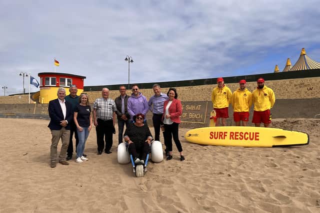L-R John O’Connell (Chair Discover Bundoran), Michael & Geraldine Patton (Salty Shell), Cllr Micheal McMahon, David Friel (Donegal County Council), Jamie Gallagher with his mother Anne (seated), Cllr Barry Sweeny, Cllr Niamh Kennedy, Lifeguards Odhran McGarrigle, Joe Danagher and Callum McKinney.